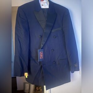 This is a 2 piece 100% tuxedo suit. The suit has never been worn.